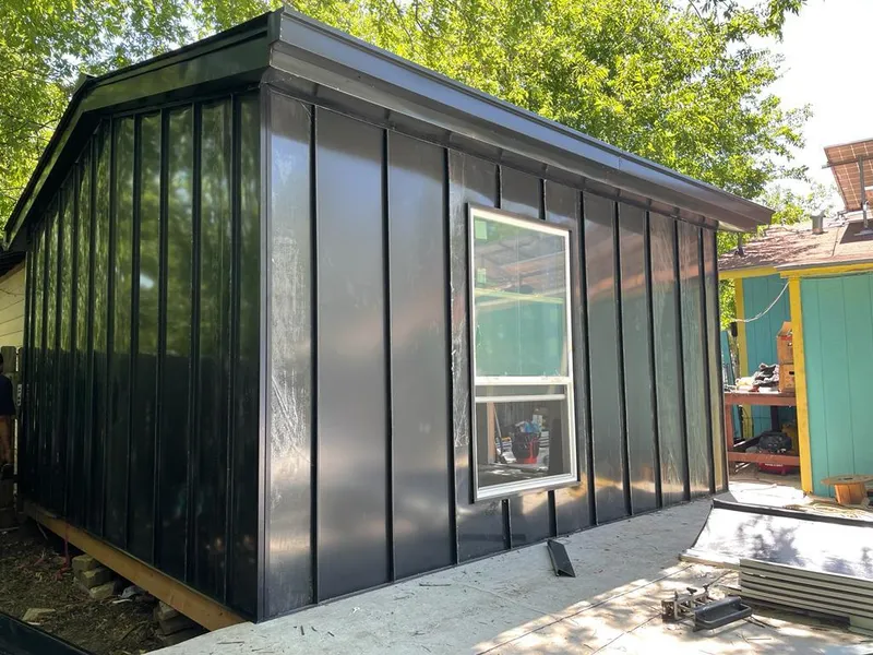 Black standing seam metal wall panels for Roof Inspection in Provo